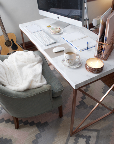 Rose gold desk accessories. Home office with rose gold accents